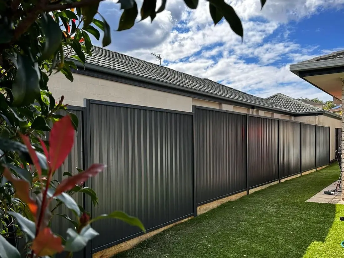 Charcoal Colorbond fence that replaced an old timber fence, built by Elite 7 Fencing
